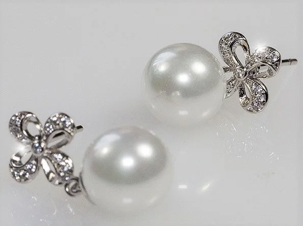 women's silver dangly earrings-Stacy White Pearl Drop Ribbon Dangle Earrings