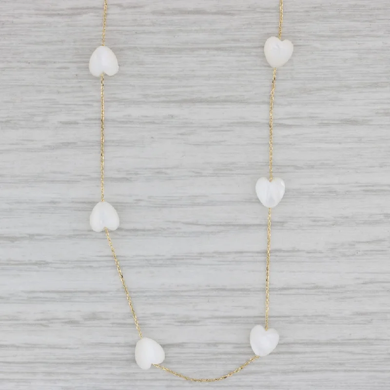 women's classic pearl necklaces-Mother of Pearl Heart Stations Necklace 14k Yellow Gold 17.75" Cable Chain