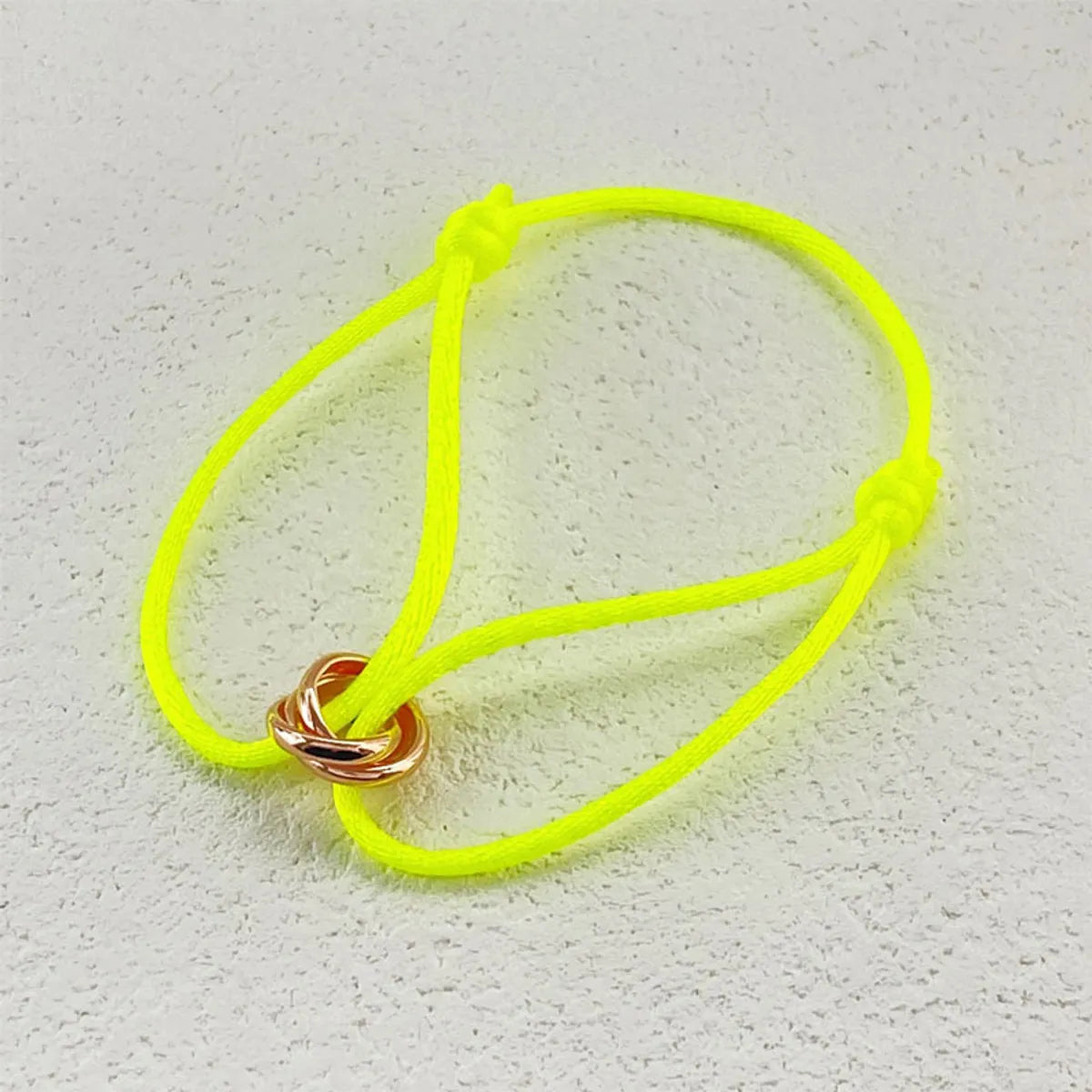 Fluorescent Yellow Rose Gold Three Rings