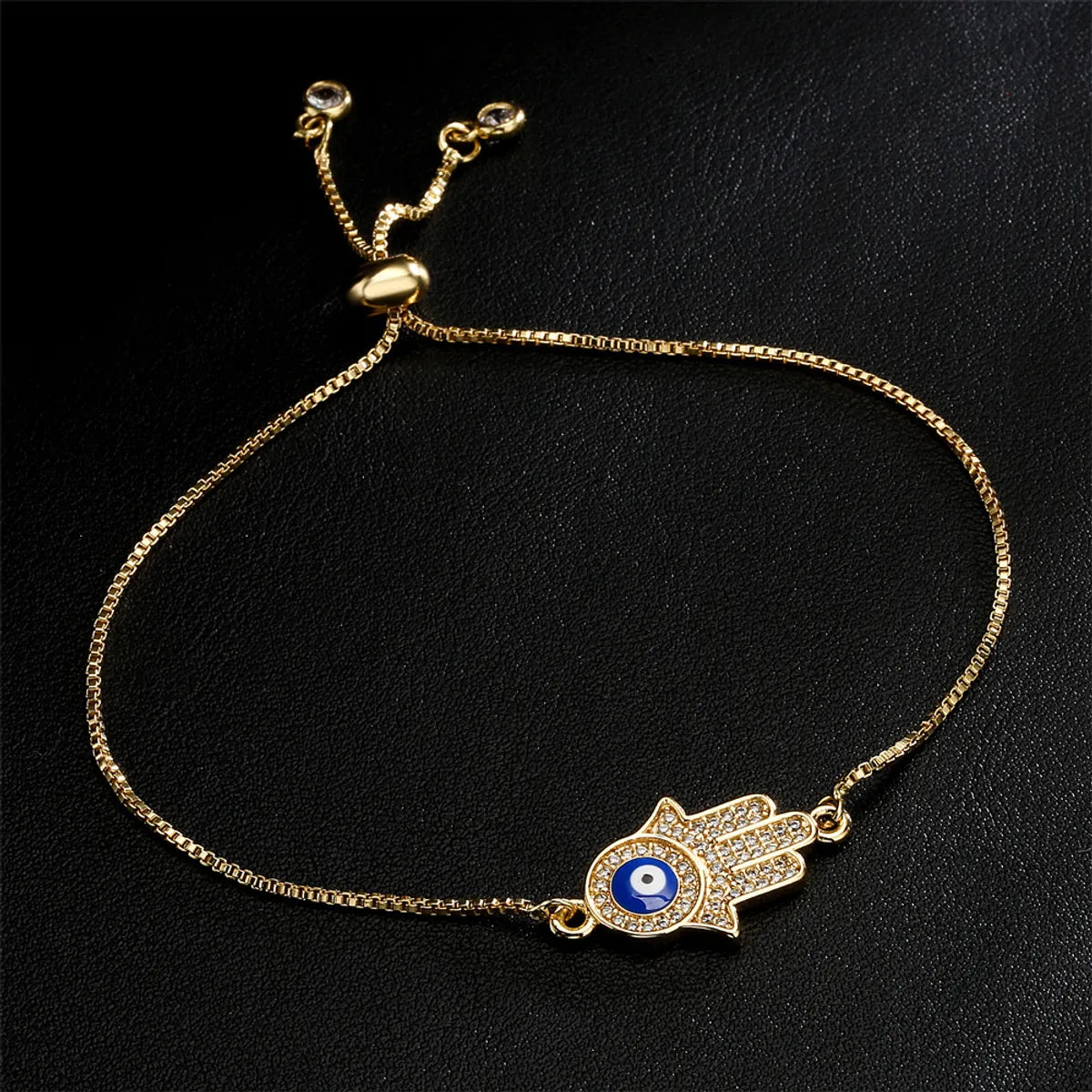 women's crystal bracelets-Fashion Drop Oil Micro-Inlaid Zircon Palm Demon Eye Lucky Gold Bracelet